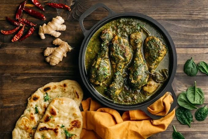 Bowl of palak chicken curry