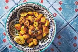 Bowl of golden roast potatoes