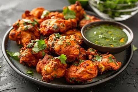 Golden fried chicken pakora pieces