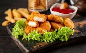 Plate of golden chicken nuggets