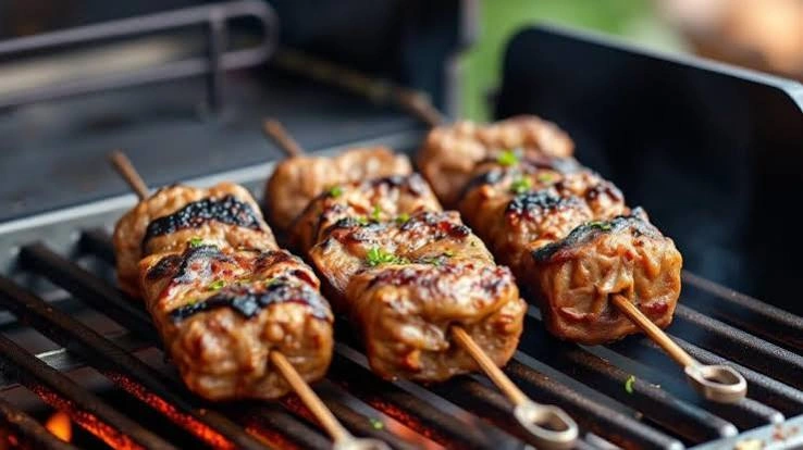 Skewered lamb tikka pieces
