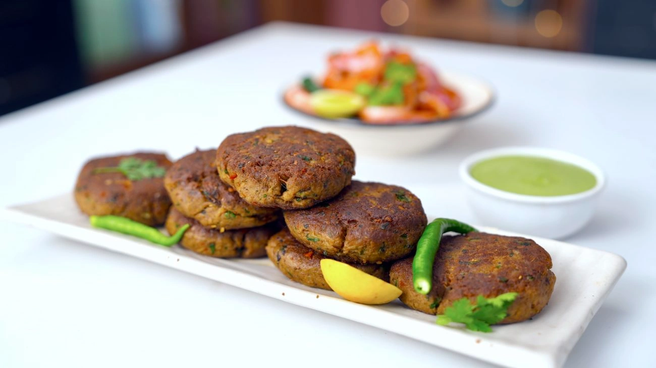 Shami kebabs on a serving plate