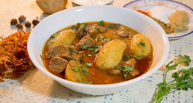 Bowl of aloo gosht curry