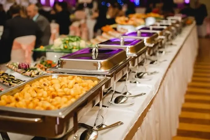 Evergreen Catering's chefs preparing dishes in the kitchen